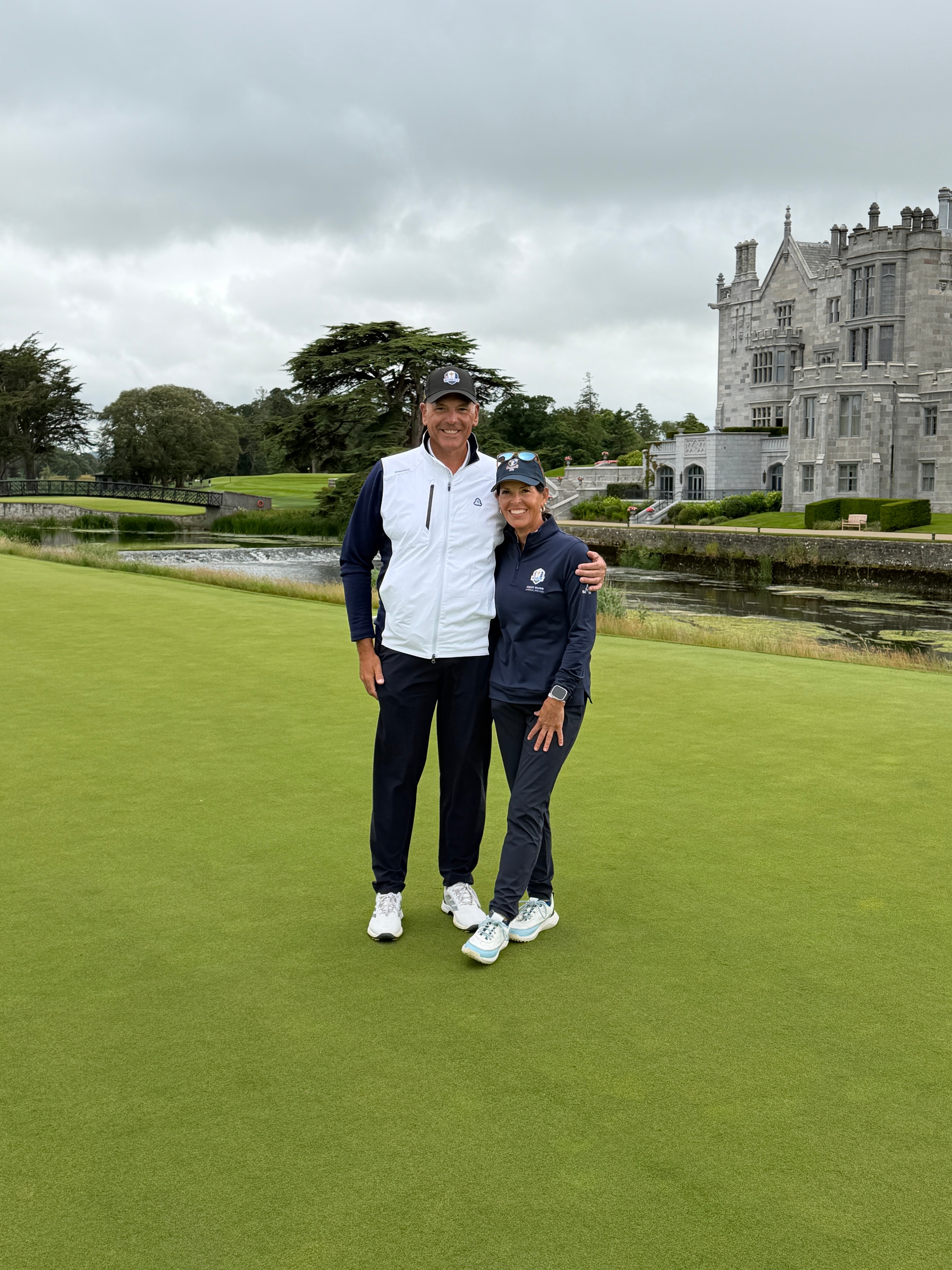 On the fairway with the manor house behind