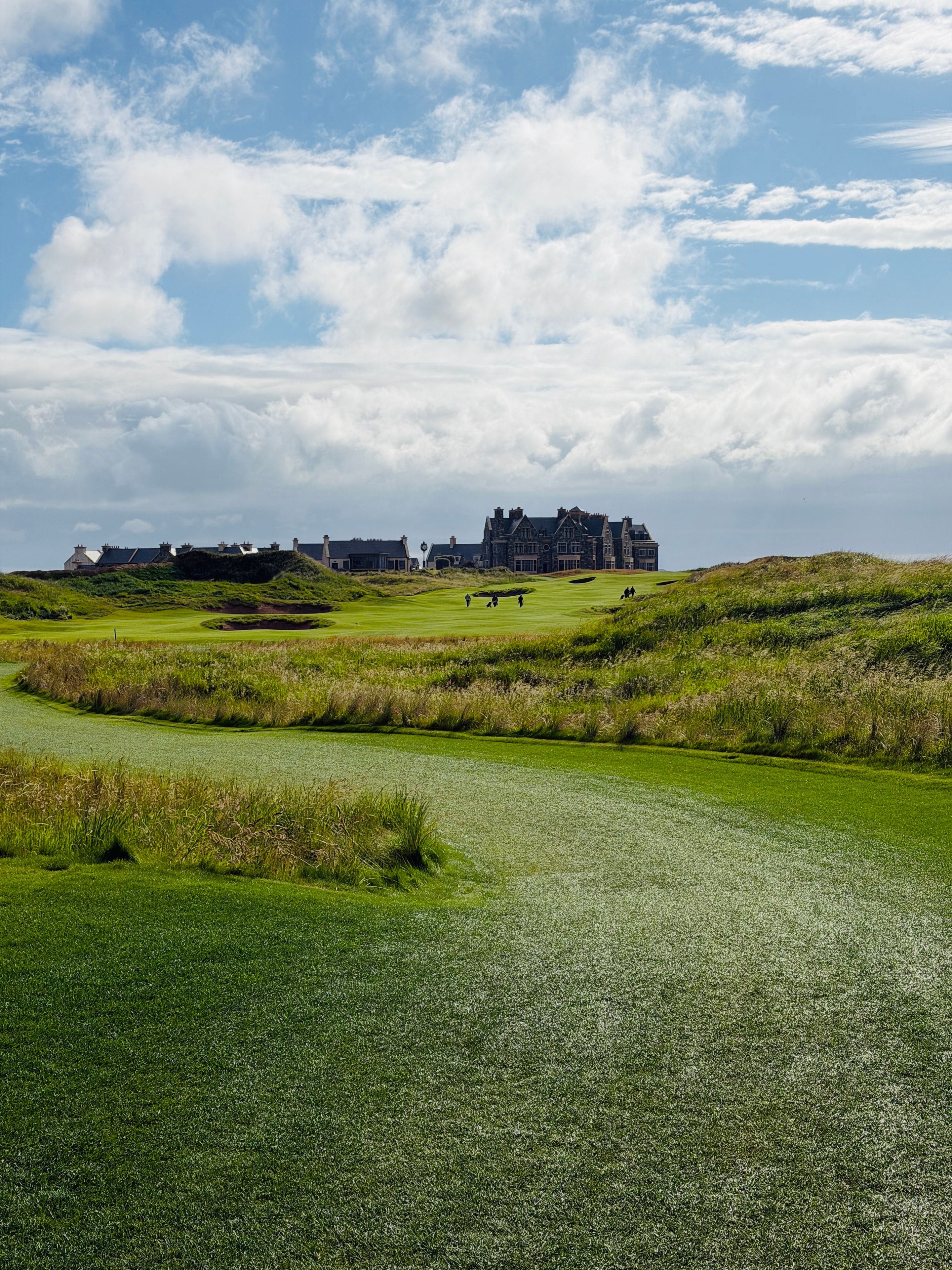 Fairway approach with the clubhouse rising from the dunes