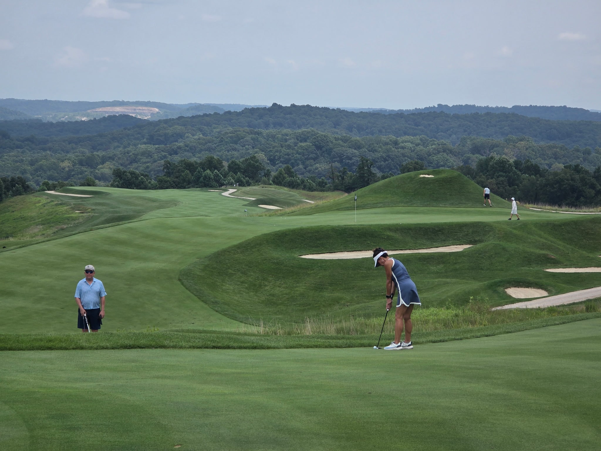 On the green — Pete Dye's dramatic mounding stretches to the horizon